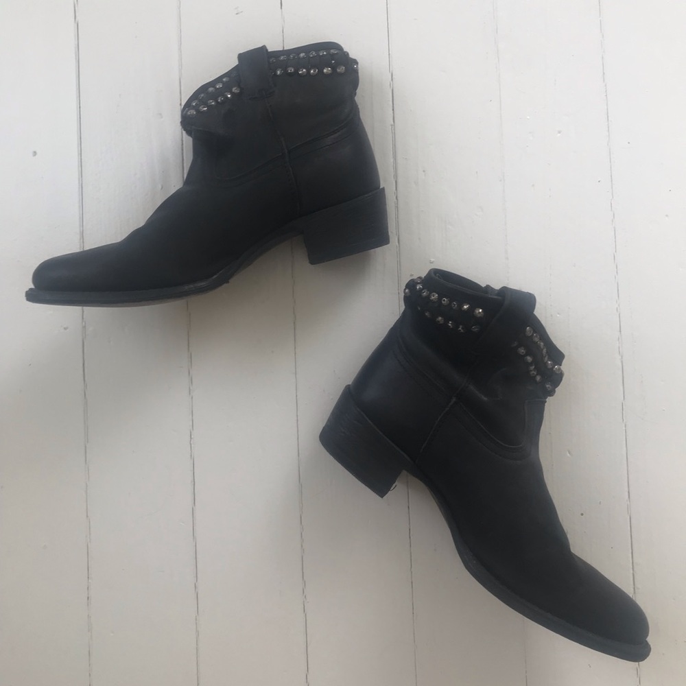 Frye black studded boots.